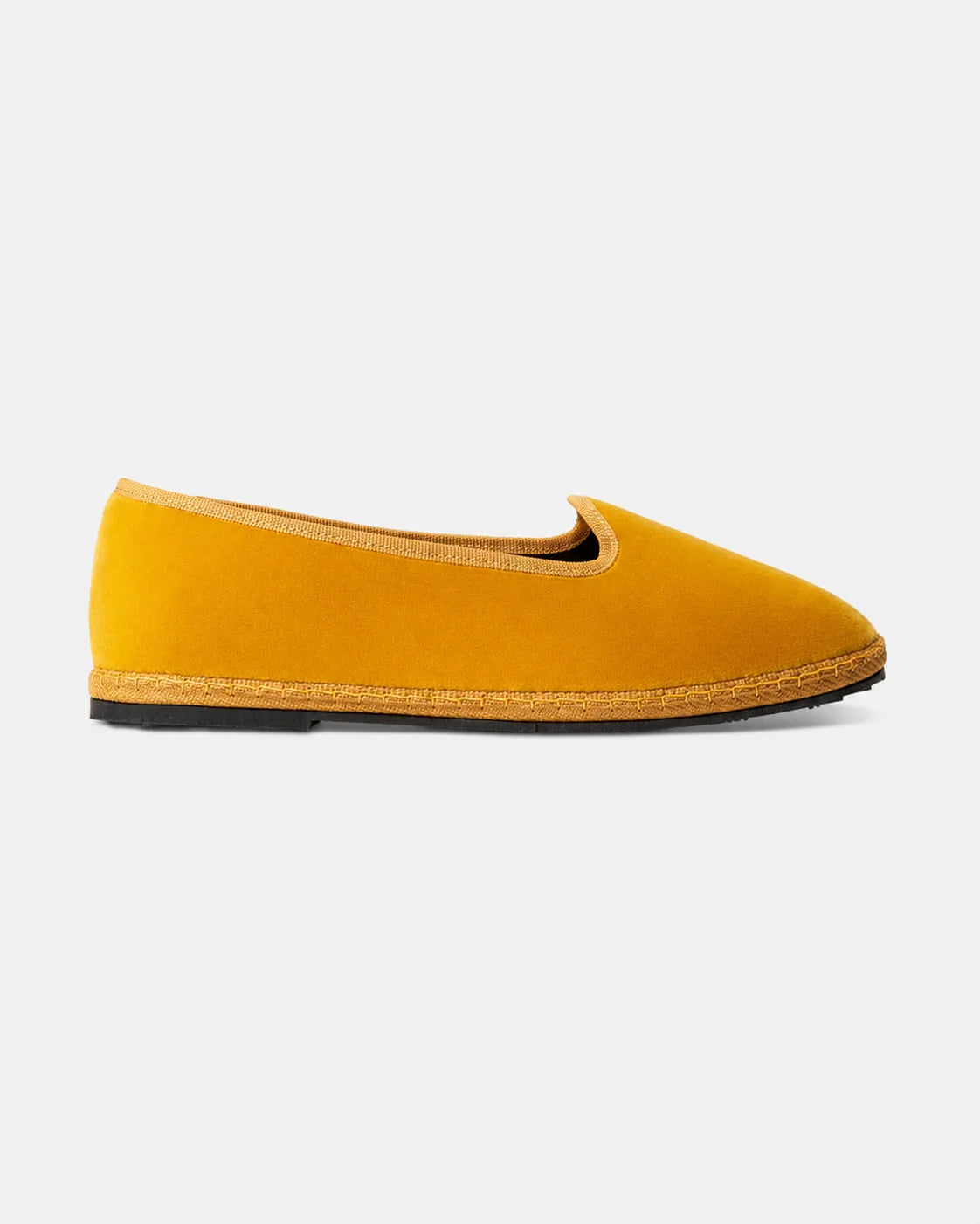 Ochre velvet Rialto friulane shoe handmade in Italy, shown from the side with black rubber sole.