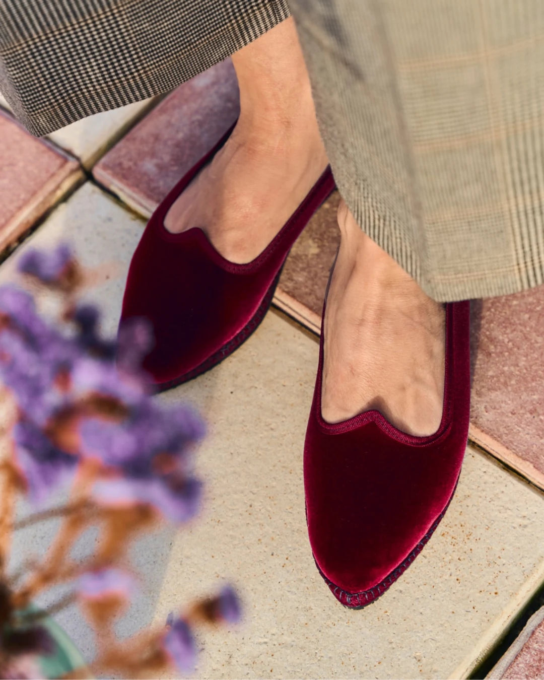 Bordeaux velvet pointed toe friulane shoes worn with tailored trousers