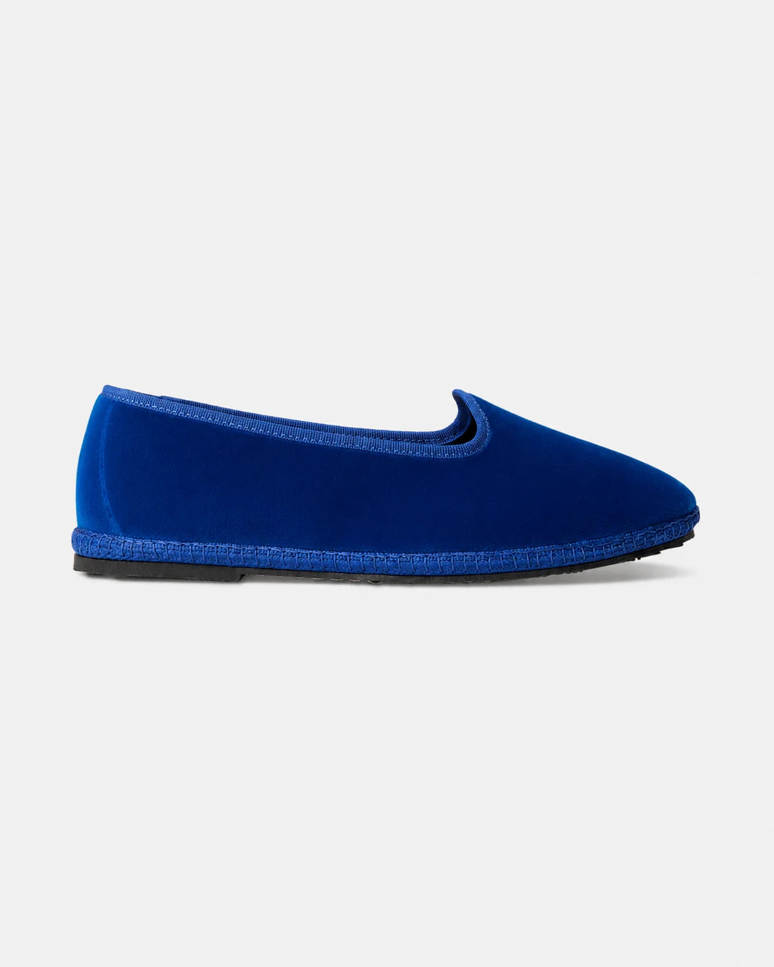 Blue velvet Rialto friulane shoe handmade in Italy, shown from the side with black rubber sole.