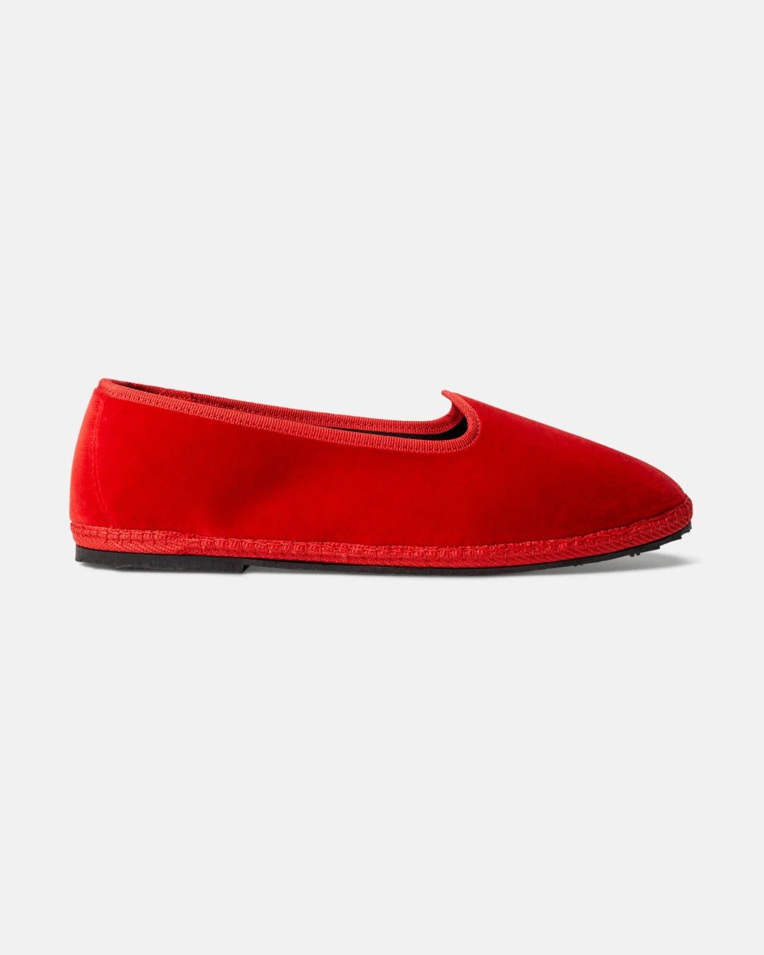 Red velvet Rialto friulane shoe handmade in Italy, shown from the side with black rubber sole