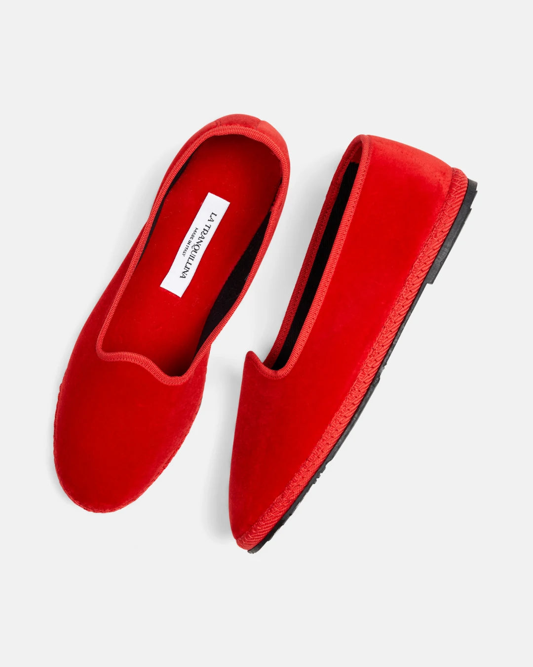 Pair of red velvet Rialto friulane shoes handmade in Italy, shown from above with LA TRANQUILLINA label.